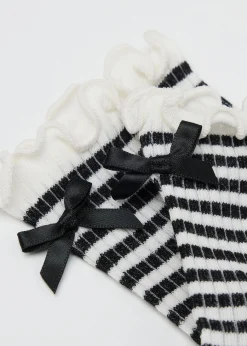 Chaussettes à rayures et nœud